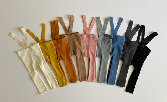 Baby Suspender Footless tights in nine colors: cream, yellow, terracotta, light brown, pink, light grey, blue, dark grey, black 